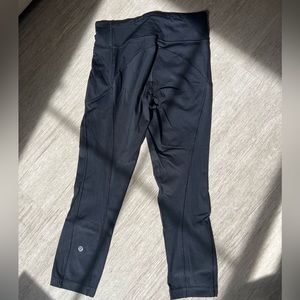 Lululemon black high rise crop leggings with side pockets